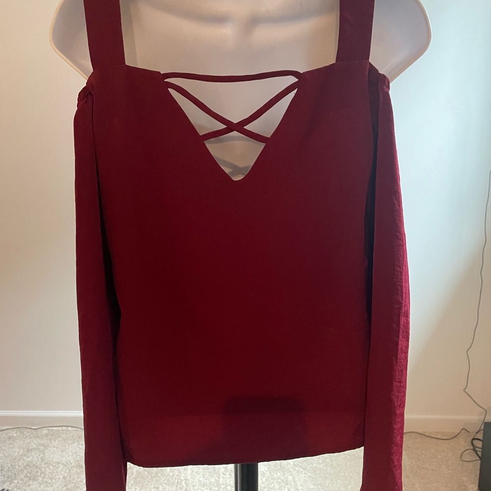 Beautiful burgundy long sleeve blouse .
